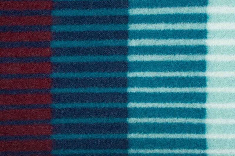RØROS “ÅSMUND GRADIENT” – SCHEERWOLLEN PLAID – ROOD TURQUOISE